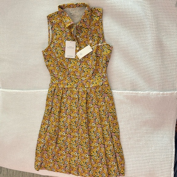 Tory Sport Dresses & Skirts - NWT Tory Sport Pleated Floral Jersey Golf Minidress